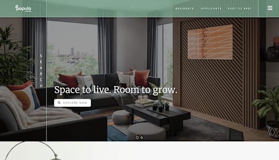 A webpage with a modern interior design theme, featuring a welcoming message and images of a living room and a person working on a laptop.